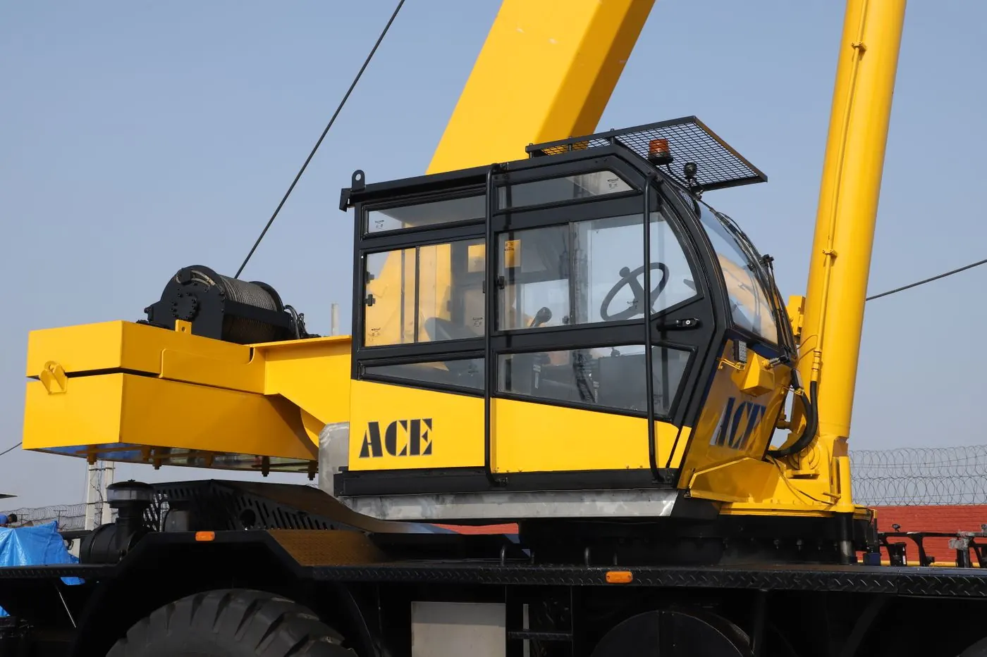 Close-up of a crane operator's cab and control panel